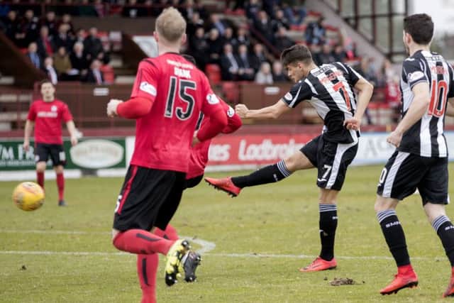 Kyle Magennis gives St Mirren the lead. Picture: SNS/Roddy Scott