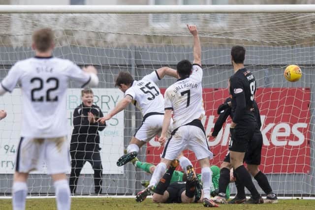 Dumbarton's Craig Barrs scores to make it 2-1. Picture: SNS/Sammy Turner