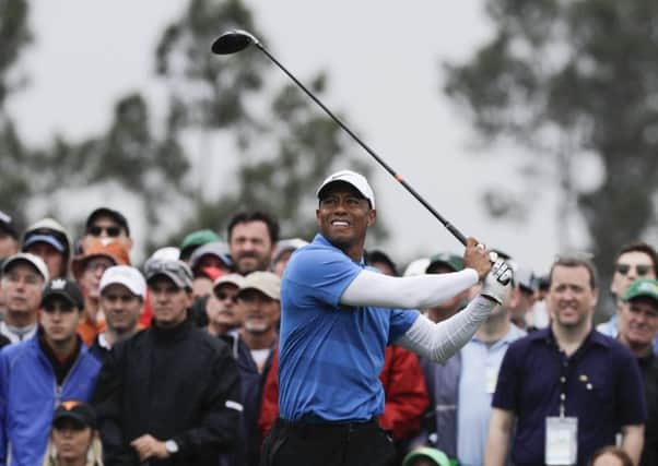 Tiger Woods hits a drive on the eighth hole during the third round of the Masters. Picture: David J. Phillip/AP