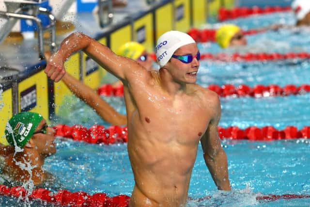 Duncan Scott celebrates after his magnificent victory in the men's 100m freestyle PICTURE: Getty
