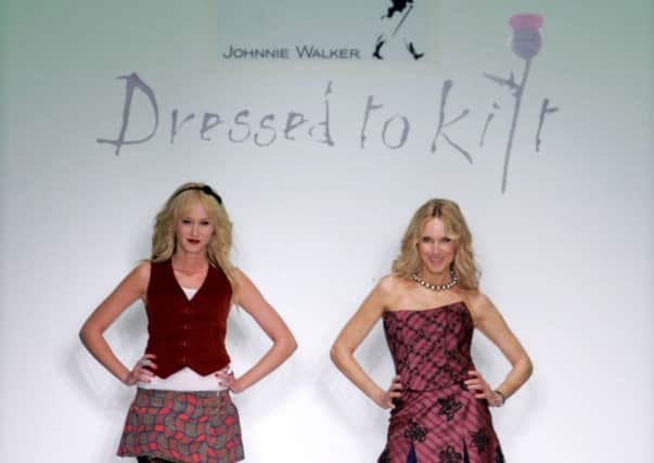 Kimberly Stewart and Alana Stewart walk the runway at the Johnnie Walker Dressed to Kilt 2006 fashion show. Picture: Getty Images.
