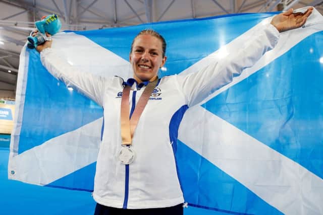 Scotland's Neah Evans celebrates with her silver medal and flag PICTURE: PA