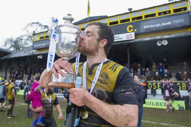 Melrose captain Grant Runciman kisses the BT Premiership trophy following his sides victory over Ayr. Picture: SNS/SRU