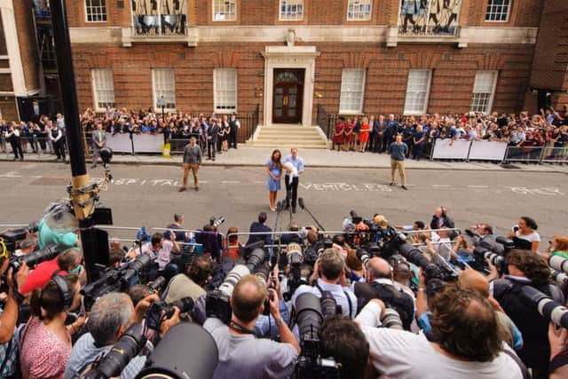The Duke and Duchess of Cambridge greet the media after the birth of their first child, Prince George. Picture: PA Wire