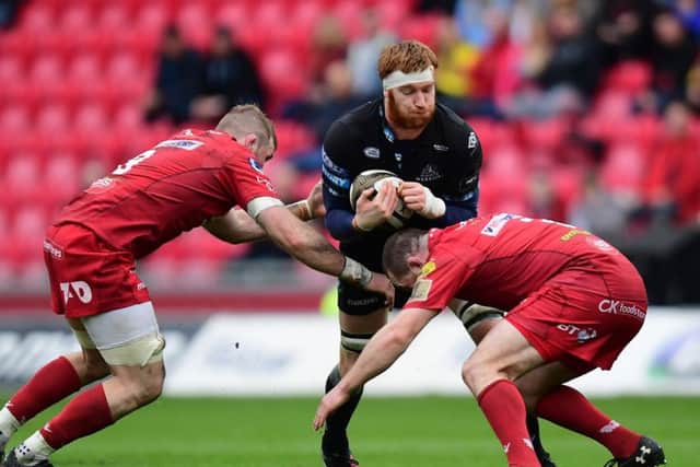 Scarlets pair John Barclay and Ken Owens charge in to tackle Glasgows Rob Harley during the weekends Pro14 encounter in Llanelli. Picture: Alex Davidson/INPHO/REX/Shutterstock
