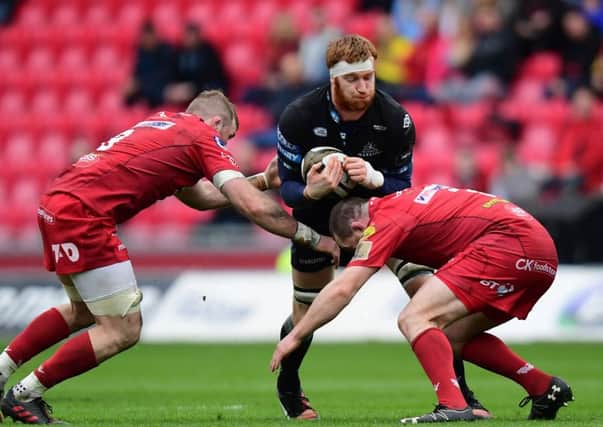Scarlets pair John Barclay and Ken Owens charge in to tackle Glasgows Rob Harley during the weekends Pro14 encounter in Llanelli. Picture: Alex Davidson/INPHO/REX/Shutterstock
