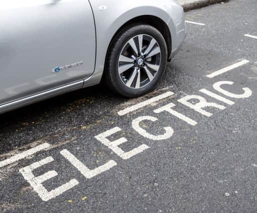A Nissan electric car on charge.