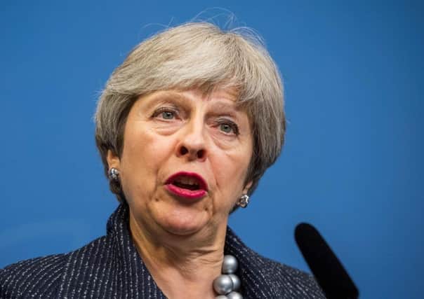 Theresa May is under pressure over possible military intervention. Picture: AFP/Getty