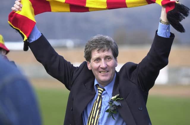 John Lambie celebrates winning promotion with Partick Thistle in 2001. Picture: Robert Perry