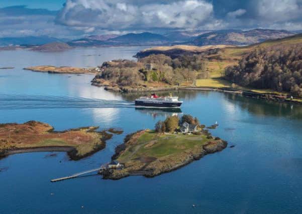 Picture: (SWNS) RUDH-A-CHRUIDH: This is one of Scotlands smallest inhabited islands with four acres of land. 
The island is linked to the bigger isle of Kerrera by a causeway at low tide, and is home to a custom-built house, designed by architect Norman Hickson the aim of which was to blend in with its surroundings.