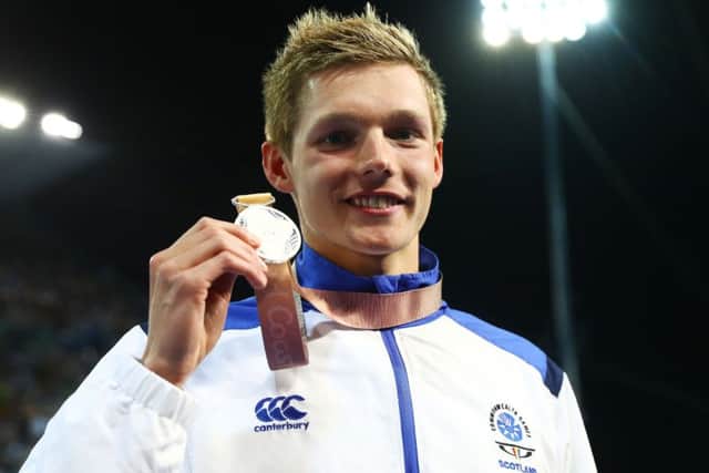 Duncan Smith with his 200m individual medley silver - a sixth medal of the Games PICTURE: Getty
