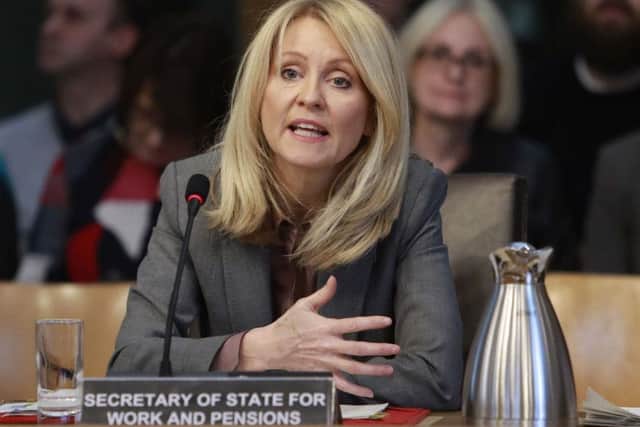Work and Pensions Secretary Esther McVey was heckled by members of the public in a Holyrood committee meeting (Picture: PA)