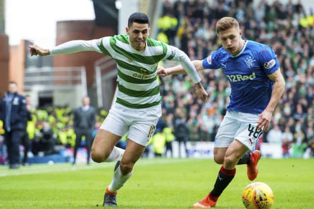 Tom Rogic of Celtic battles with Rangers' Greg Docherty in the last Old Firm clash. Picture: SNS Group