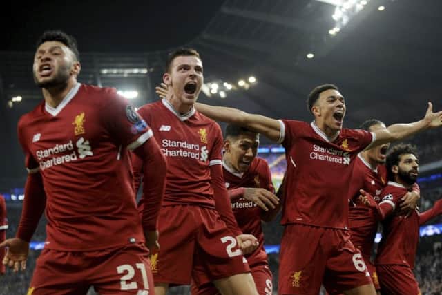 Liverpool players celebrate at full-time having completed a 5-1 aggregate victory over Manchester City. Picture: AP.
