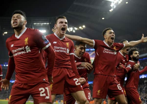 Liverpool players celebrate at full-time having completed a 5-1 aggregate victory over Manchester City. Picture: AP.