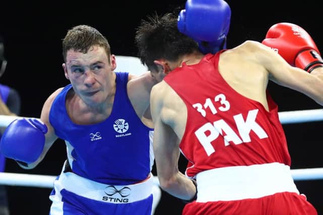 Reece McFadden lands a blow on his Pakistani opponent. PICTURE: Getty Images