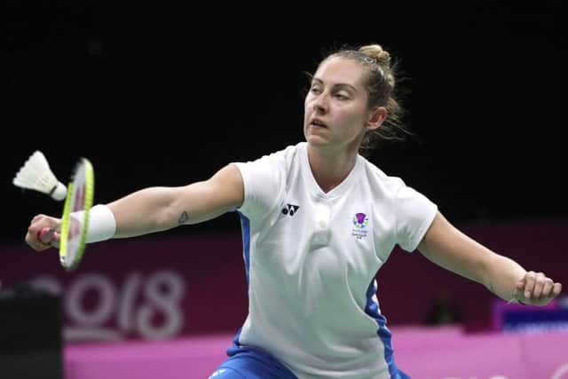 Kirsty Gilmour of Scotland returns the shuttlecock to Mauritius' Aurelia Allet in her women's singles win. PICTURE: AP