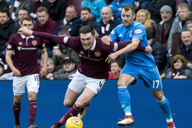 Hearts' John Souttar holds off Aberdeen's Niall McGinn at Tynecastle, which will only host two more games this season. Picture: Alan Harvey/SNS