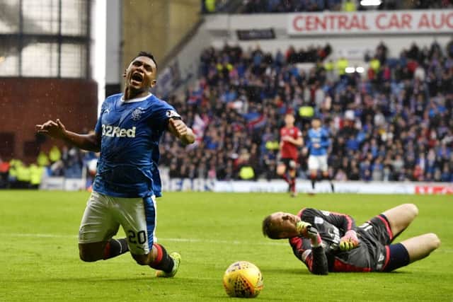 Alfredo Morelos was booked for alleged simulation during Rangers' 4-0 win over Dundee. Picture: SNS