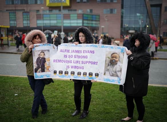 A protest outside the hospital where Alfie is receiving care. Photo by Christopher Furlong/Getty Images)
