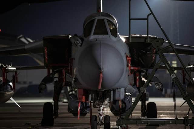 An RAF Tornado, which was used in the airstrikes on Syria,  back in the hangar at RAF Akrotiri in Cyprus. Picture: MOD/CPL L MATTHEWS/AFP/Getty
