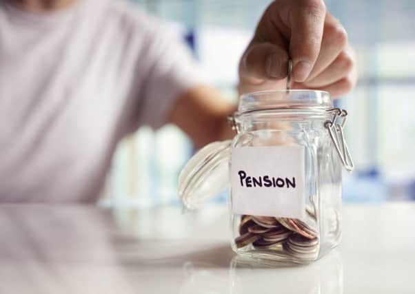 A generic photo of a pan dropping coins into a jar labelled 'pension'. See PA Feature FINANCE Pension. Picture credit should read: PA Photo/thinkstockphotos. WARNING: This picture must only be used to accompany PA Feature FINANCE Pension
