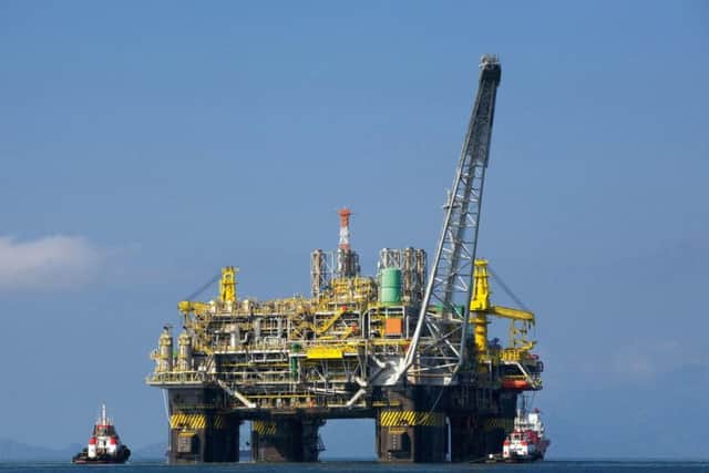 The slowdown in the oil and gas sector has hit GDP growth in Scotland, the report said.