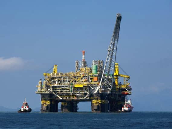 The slowdown in the oil and gas sector has hit GDP growth in Scotland, the report said.