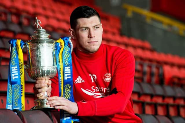 Scott McKenna had an unsuccessful loan period at Ayr before making his Aberdeen breakthrough. Picture: SNS