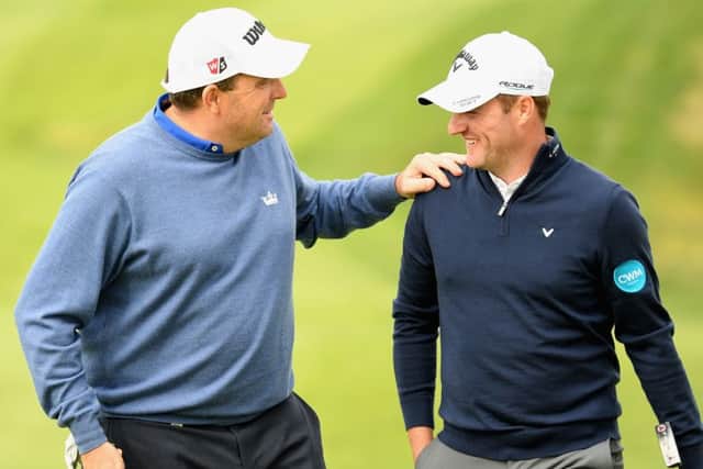 Englands Anthony Wall, left, jokes with playing partner Marc Warren at the Open de Espana. Picture: Getty