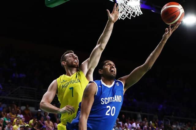 Kieron Achara of Scotland shoots as Nicholas Kay of Australia defends during the semi-final match PICTURE: Getty Images