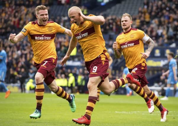 Motherwell's Curtis Main wheels away after opening the scoring. Picture: SNS/Rob Casey