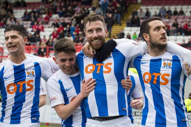 Kilmarnock's Kirk Broadfoot celebrates his goal with teammates. Picture: SNS/Alan Harvey