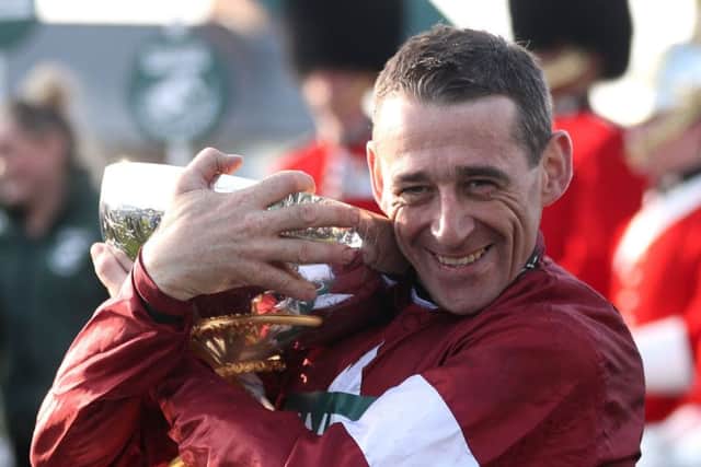 Winning jockey Davy Russell celebrates his triumph. Photograph: David Davies/PA