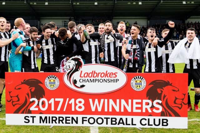 St Mirren celebrate as they win the Ladbrokes Championship title. Picture: SNS/Ross Parker