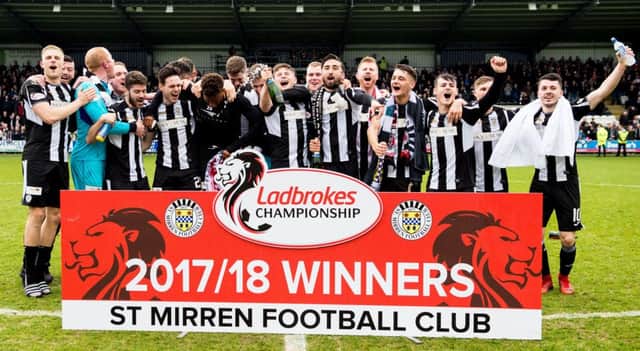 St Mirren celebrate as they win the Ladbrokes Championship title. Picture: SNS/Ross Parker