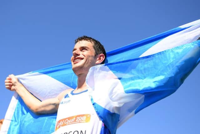 Scotland's Robbie Simpson celebrates marathon bronze PICTURE: Getty Images
