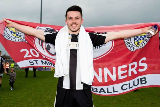 Lewis Morgan celebrates St Mirren's title triumph. Picture: SNS
