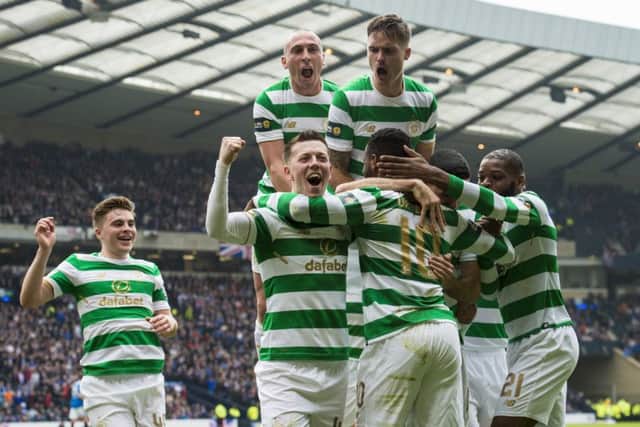 Moussa Dembele celebrates his goal with team-mates. Picture: SNS Group