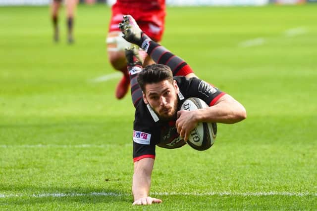 Sam Hidalgo-Clyne dives over for his try, one of eight scored by Edinburgh on Saturday. Picture: SNS/SRU