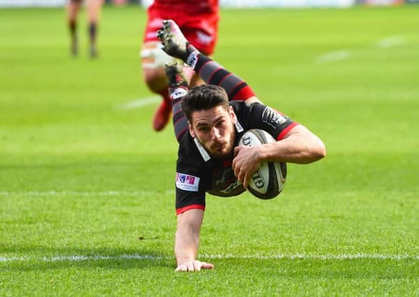 Sam Hidalgo-Clyne dives over for his try, one of eight scored by Edinburgh on Saturday. Picture: SNS/SRU