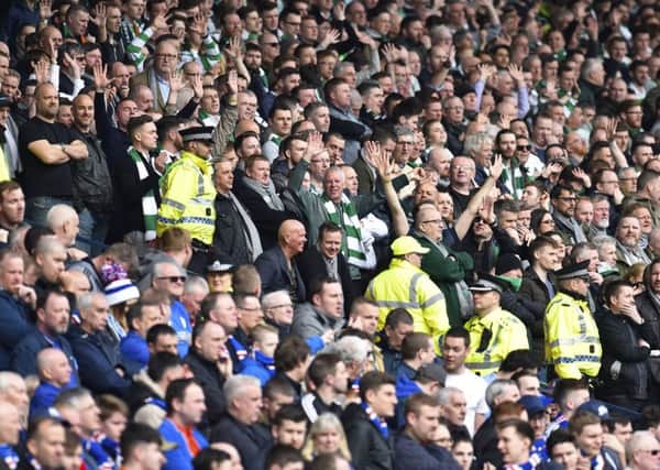 The Celtic and Rangers fans in the stands. Picture: SNS/Rob Casey