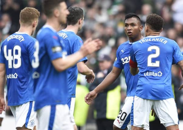 Greg Docherty, left, and Alfredo Morelos (right) exchange words on the pitch before clashing in the tunnel. Picture: SNS Group