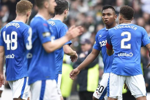 Greg Docherty, left, and Alfredo Morelos (right) exchange words on the pitch before clashing in the tunnel. Picture: SNS Group