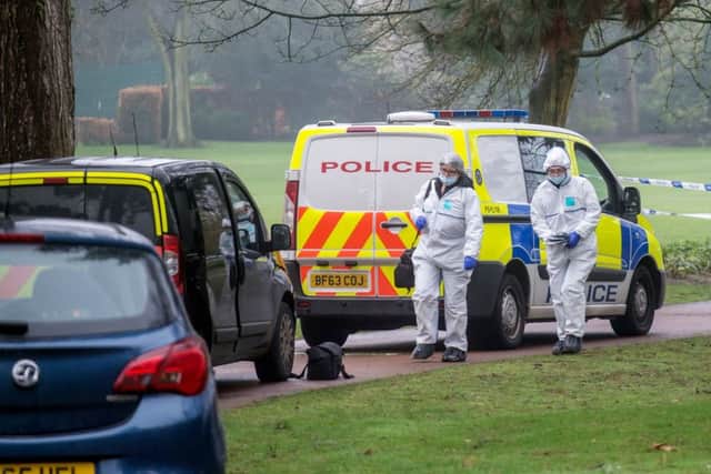 Police and forensics at the scene in West Park, Wolverhampton. Picture: SWNS