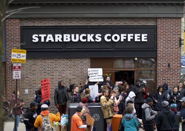 Protestors demonstrate outside a Starbucks in Philadelphia, Pennsylvania. Picture: Mark Makela/Getty Images