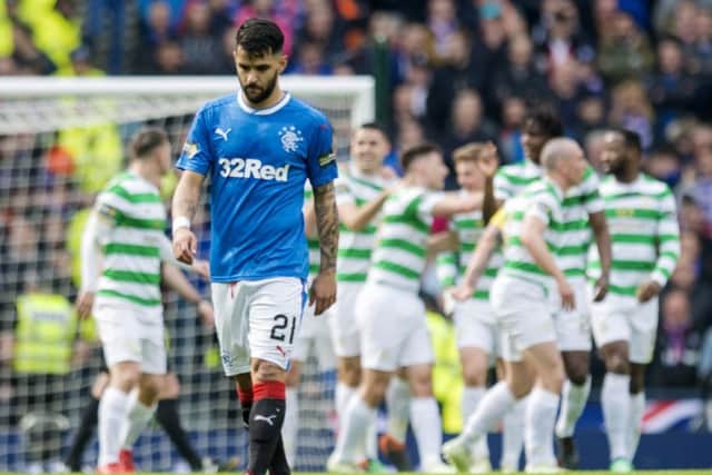 A dejected Daniel Candeias walks away as Celtic score again in the Scottish Cup semi-final. Picture: SNS