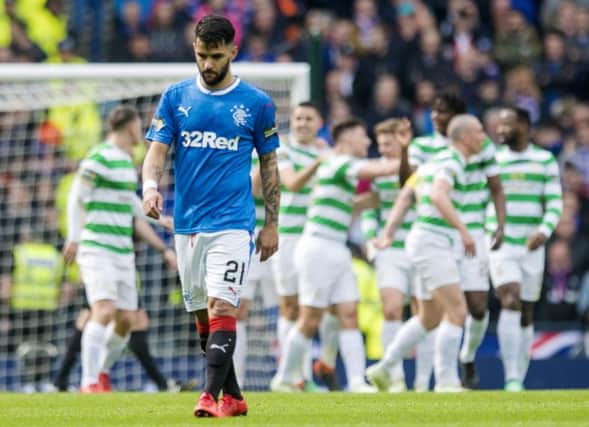 A dejected Daniel Candeias walks away as Celtic score again in the Scottish Cup semi-final. Picture: SNS