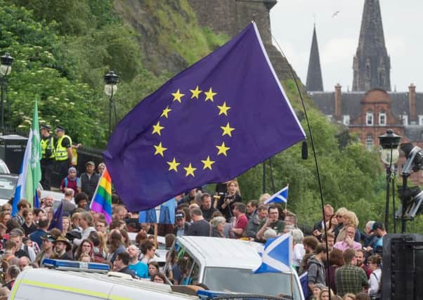A march in support of the UK's membership of the EU makes its way through Edinburgh