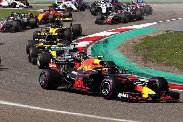 Max Verstappen leads Lewis Hamilton , but eventually finished fifth after being penalised ten seconds as a result of his collision with Sebastian Vettel. Picture: Getty.